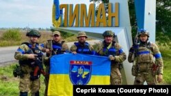 Бойцы батальона Национальной полиции Украины «Запад» после освобождения города Лимана от российской армии. Лиман, Донецкая область, 2 октября 2022 года