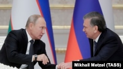 Prezidentlar Vladimir Putin va Shavkat Mirziyoyev. 